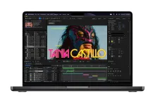 Apple's new 14-inch MacBook Pro with the M6 chip shown front-on running video editing software.