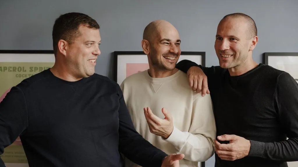 Daytona chief executive Ivan Burazin flanked by chief architect Goran Draganić and chief technology officer Vedran Jukic in a company photograph.