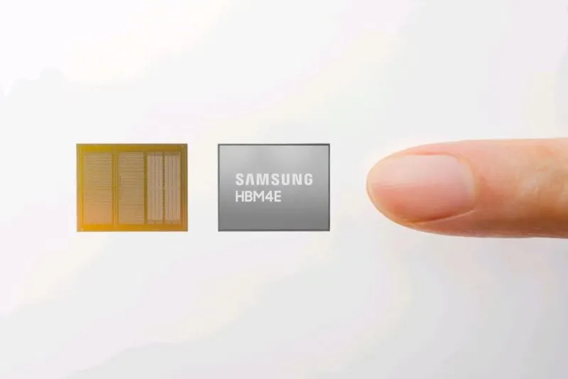 Samsung HBM4E memory chips photographed next to a fingertip for scale.